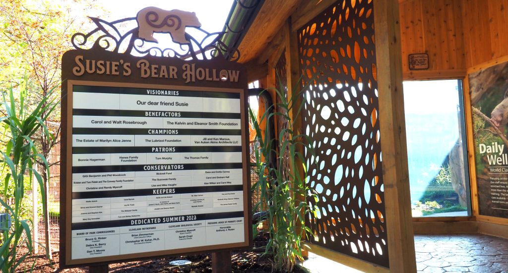 Freestanding outdoor donor recognition display with many donor categories and changeable nameplates.