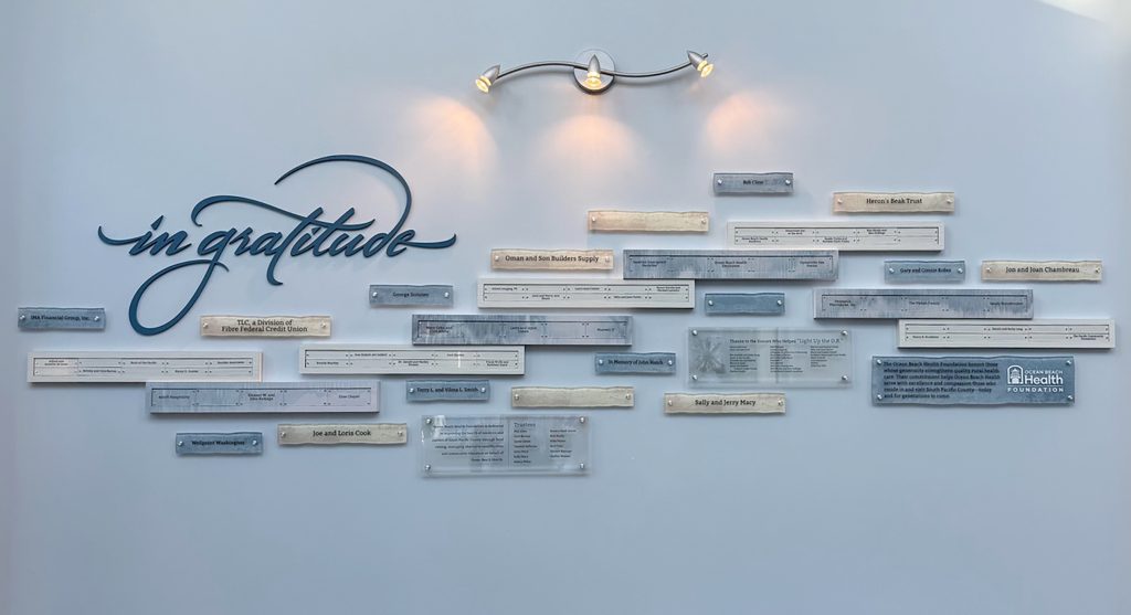 A completed modular donor recognition display  whose material selection was guided by the environment to provide seamless integration in its surroundings.