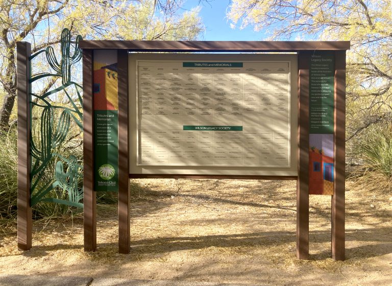Outdoor donor recognition display at Tohono Chul featuring Corten steel structure and Dark Sky compliant lighting in a desert setting