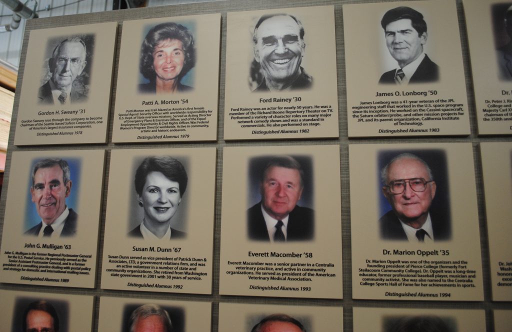 Close-up of Centralia College alumni recognition plaques arranged in structured Hall of Fame display grid.