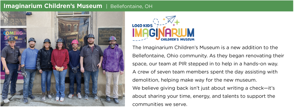 PIR team members wearing hard hats stand outside the Imaginarium Children’s Museum building in Bellefontaine, Ohio during a volunteer demolition project.