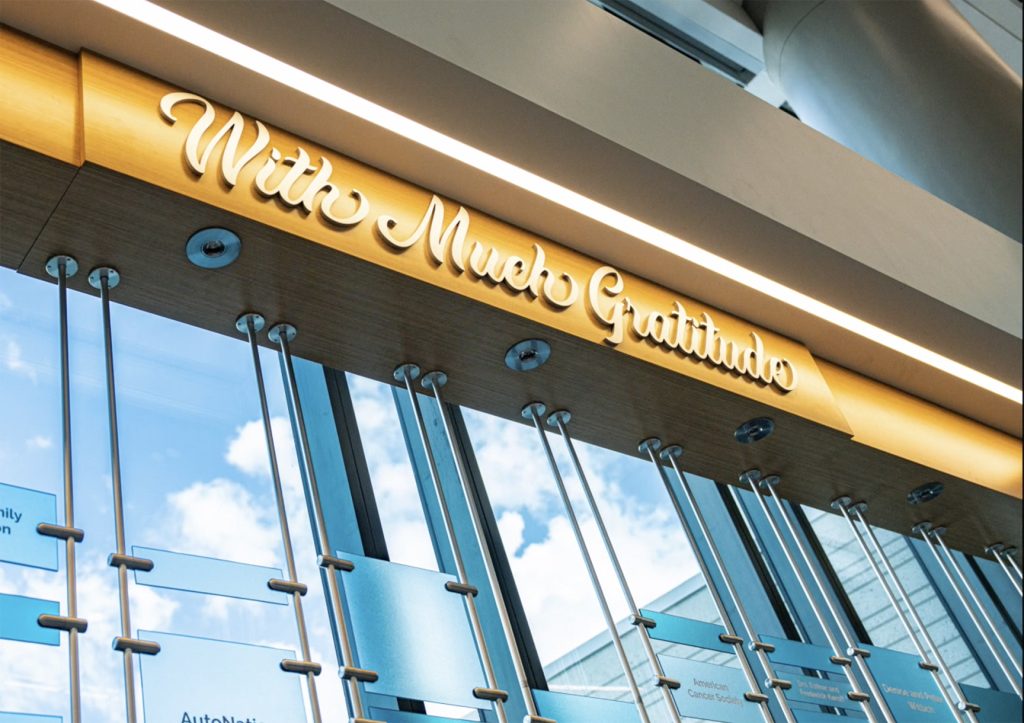 “With Much Gratitude header integrated into suspended donor recognition display”