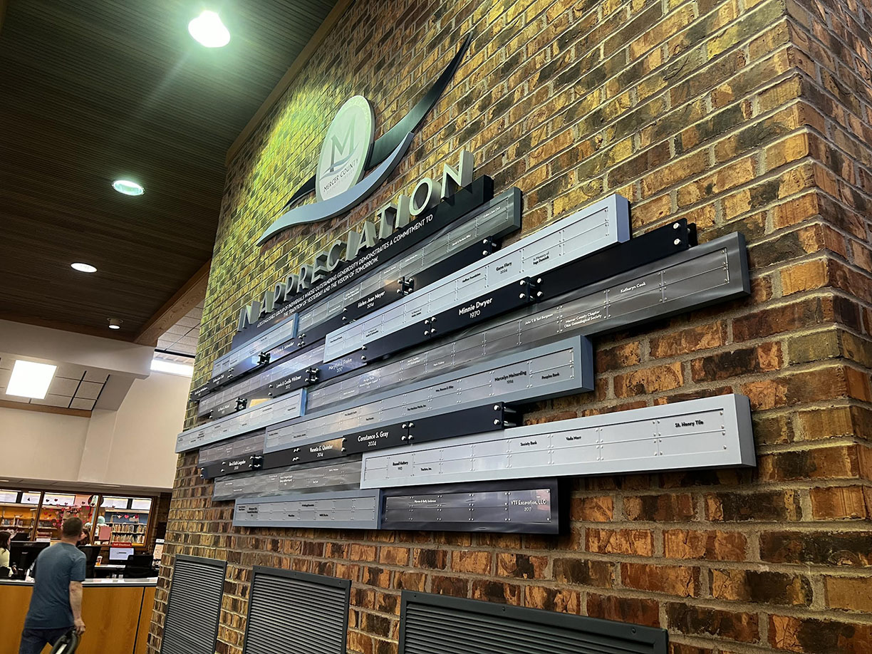 Angled view of the donor recognition display at Mercer County District Library.