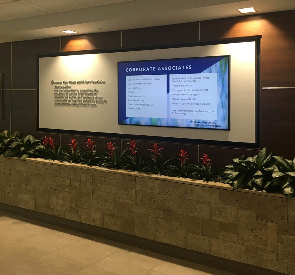 Digital recognition display that sits at the entrance of a healthcare facility.
