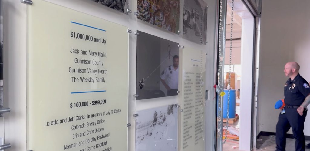 healthcare donor recognition wall with a changeable suspension system