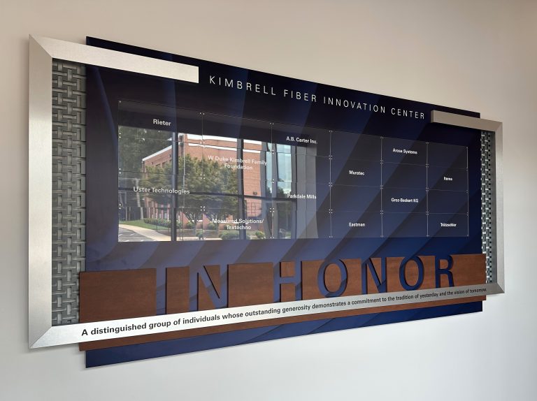 Corporate donor recognition display that incorporates changeable, cleartech nameplates for their corporate donors at their college.