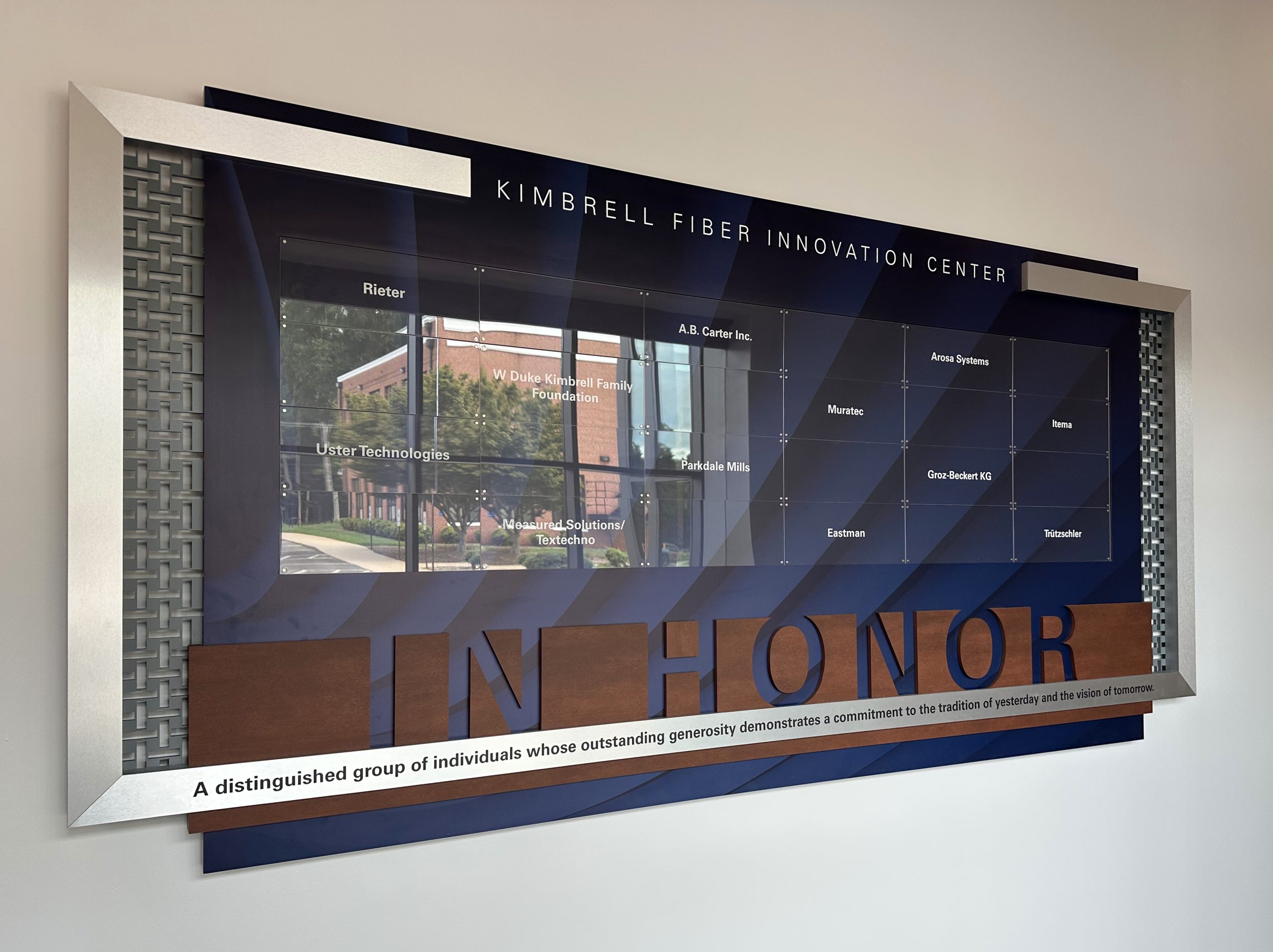 Corporate donor recognition display that incorporates changeable, cleartech nameplates for their corporate donors at their college.