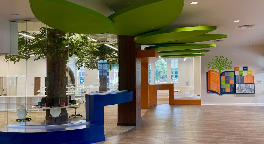 A digital donor recognition display that incorporates environmental elements into the structure and design.