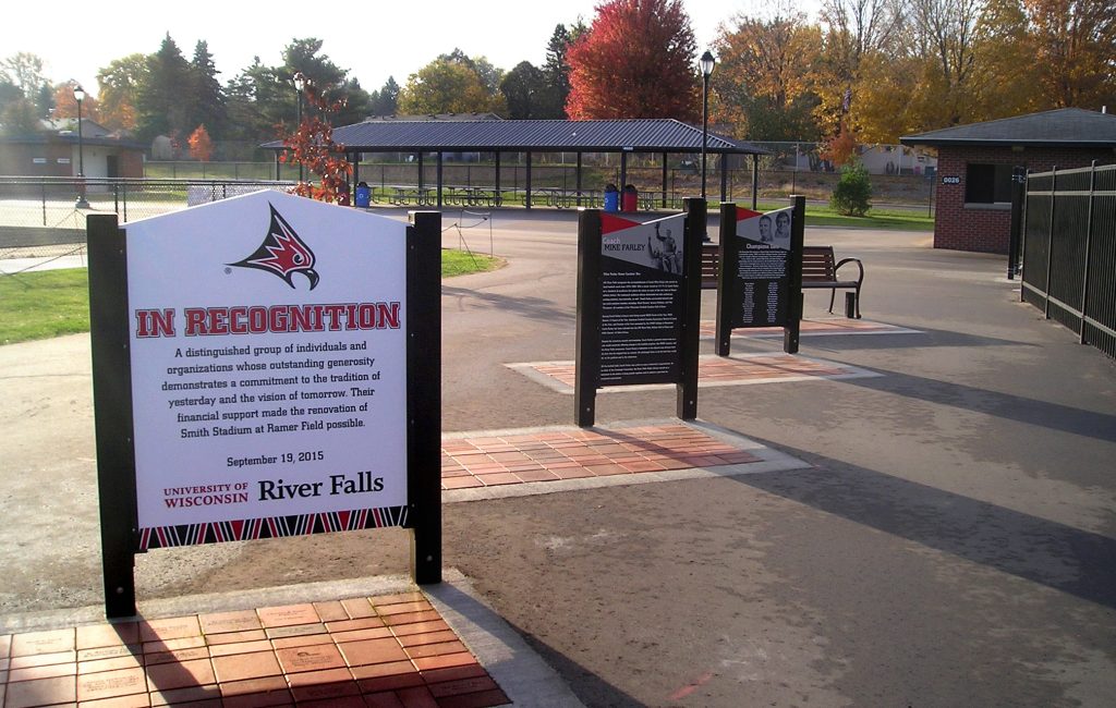 Freestanding recognition panels for a college that honored coaches and donors installed next to their stadium.