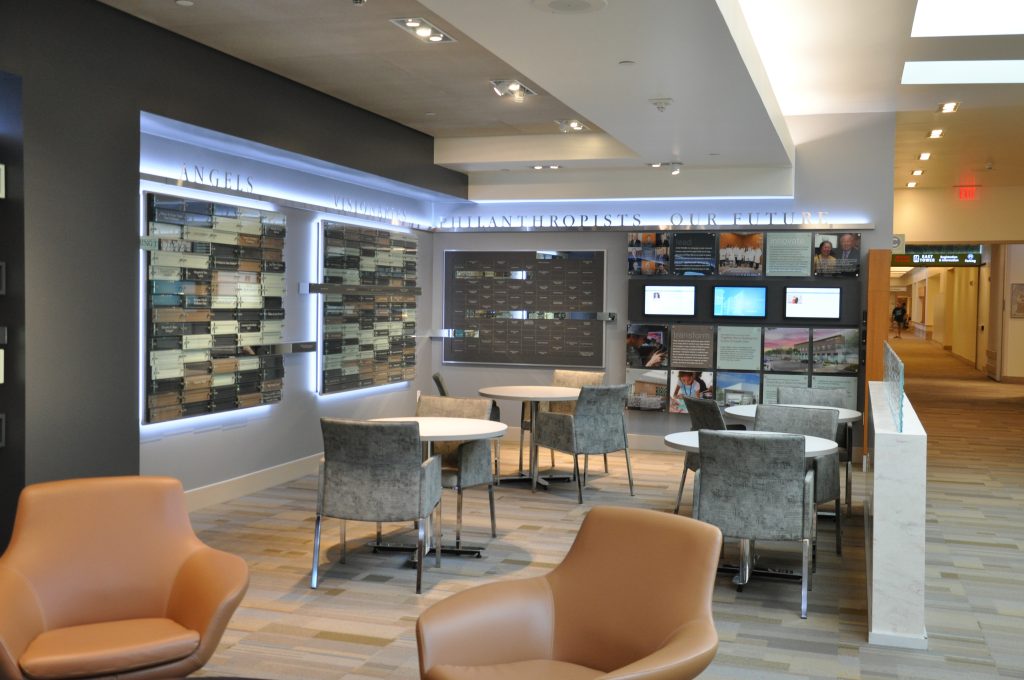 Consistent branding throughout multiple donor recognition displays at a healthcare facility.